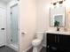 Clean bathroom with glass-enclosed shower and modern vanity at 4702 W Heron Ln, Tampa, FL 33629