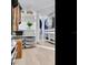 Walk-in closet with built in shelving and storage units, with hardwood flooring and a mirror at 4702 W Heron Ln, Tampa, FL 33629