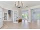 Open foyer with staircase and views to backyard at 4702 W Heron Ln, Tampa, FL 33629