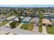 Aerial view of waterfront homes, highlighting the canal access and lush, green yards at 5051 Bonito Dr, New Port Richey, FL 34652