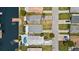 Aerial view showcases the property's layout, waterfront access, and proximity to neighborhood amenities at 5051 Bonito Dr, New Port Richey, FL 34652