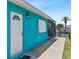 Outdoor entry door to the house showing gravel detail and a nearby waterway at 5051 Bonito Dr, New Port Richey, FL 34652