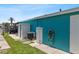 Exterior view shows storage and outdoor utility access, complementing the home's functionality and convenience at 5051 Bonito Dr, New Port Richey, FL 34652