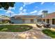 Spacious backyard with patio area and outdoor seating, ideal for relaxation and gatherings at 509 Stone Dr, Brandon, FL 33510