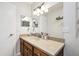Bathroom featuring modern vanity, updated mirror, and neutral-colored walls at 509 Stone Dr, Brandon, FL 33510