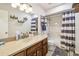 Bathroom featuring modern vanity, updated mirror, and shower with tub combination at 509 Stone Dr, Brandon, FL 33510