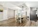 Bright and open dining area with modern lighting and sleek, neutral decor at 509 Stone Dr, Brandon, FL 33510