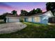 Charming home with a two-car garage, a well-maintained lawn, and classic white shutters at 509 Stone Dr, Brandon, FL 33510