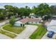 Attractive single-story home featuring a well-maintained lawn, mature trees, and a cozy, inviting facade at 509 Stone Dr, Brandon, FL 33510