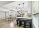 Bright, modern kitchen with sleek white cabinets, stainless steel appliances, and bar seating at 509 Stone Dr, Brandon, FL 33510