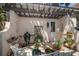 Outdoor courtyard featuring a grill, fountain, and a covered seating area, creating a private oasis at 514 Riviera Dr, Tampa, FL 33606