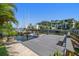 Private boat dock featuring a boat lift and a walkway overlooking the water at 514 Riviera Dr, Tampa, FL 33606