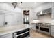 Beautiful kitchen equipped with stainless steel appliances, a granite countertop, and custom cabinetry at 514 Riviera Dr, Tampa, FL 33606