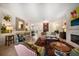 Spacious living room with comfortable seating, refined décor, and a cozy fireplace at 514 Riviera Dr, Tampa, FL 33606