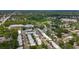 An aerial view displaying a residential area next to green spaces and sports fields at 602 Mindy Dr, Largo, FL 33771