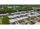 Elevated view of a residential area, showing multiple homes and tree-lined streets at 602 Mindy Dr, Largo, FL 33771