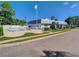 Charming single-story building featuring a community pool, well-kept lawn and professional landscaping at 602 Mindy Dr, Largo, FL 33771