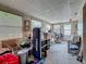 Bright living area with multiple windows, featuring an open layout and lots of potential at 602 Mindy Dr, Largo, FL 33771