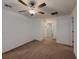A bright bedroom featuring neutral walls, plush carpeting and plenty of natural light at 6444 Bar S Bar Trl, Zephyrhills, FL 33541