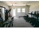Well-equipped gym featuring modern treadmills and weight machines for a complete workout experience at 6444 Bar S Bar Trl, Zephyrhills, FL 33541