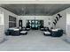 Outdoor lounge area featuring comfortable seating and sleek modern design at 6444 Bar S Bar Trl, Zephyrhills, FL 33541