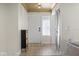 Inviting foyer with stylish flooring and a decorative light fixture at 6875 11Th N Ave, St Petersburg, FL 33710