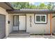 Charming home featuring a well-lit front door and stylish house numbers at 6875 11Th N Ave, St Petersburg, FL 33710