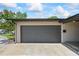 Spacious single car garage with sleek door and ample parking at 6875 11Th N Ave, St Petersburg, FL 33710