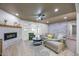 Inviting living room featuring a white brick fireplace and comfortable seating at 6875 11Th N Ave, St Petersburg, FL 33710