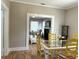 Open dining and living room space with hardwood floors at 717 Jackson N St, St Petersburg, FL 33705