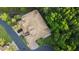 Aerial view of a townhome with lush trees at 7246 Gaberia Rd, New Port Richey, FL 34655