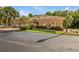 Beautifully landscaped exterior of home featuring lush greenery and mature trees at 7246 Gaberia Rd, New Port Richey, FL 34655