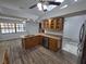 Updated kitchen with stainless steel appliances and granite countertops at 7278 Radcliff St, Spring Hill, FL 34606