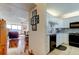 Open-concept design showcasing the kitchen with granite counters and modern appliances, seamlessly connecting to the adjacent living spaces at 7465 Bay Island S Dr # 213, South Pasadena, FL 33707