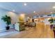 Inviting lobby area featuring hardwood floors, comfortable seating, and stylish decor at 7465 Bay Island S Dr # 213, South Pasadena, FL 33707