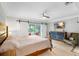 Primary bedroom with sliding doors to a patio and an en-suite bath at 8203 Kirkwood Dr, Tampa, FL 33634