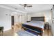Bedroom featuring a modern bed frame, hardwood floors, and a ceiling fan at 8203 Kirkwood Dr, Tampa, FL 33634