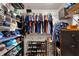 Walk-in closet providing ample storage with custom shelves and drawers at 8203 Kirkwood Dr, Tampa, FL 33634