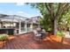 Exterior deck and backyard features a pool, screened in porch, and waterfront views at 8203 Kirkwood Dr, Tampa, FL 33634