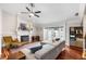 Comfortable living room featuring a fireplace, ample seating, and modern decor at 8203 Kirkwood Dr, Tampa, FL 33634