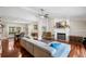 Bright living room with fireplace, hardwood floors, and large windows at 8203 Kirkwood Dr, Tampa, FL 33634
