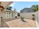 The outdoor patio has brick pavers, an outdoor seating area, and access to the home at 8203 Kirkwood Dr, Tampa, FL 33634