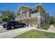 Charming townhouse with two-car garage and beautiful landscaping in a desirable neighborhood, perfect for comfortable living at 8447 Shallow Creek Ct, New Port Richey, FL 34653
