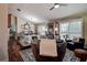 Inviting living room featuring hardwood floors, natural light, and stylish furnishings, creating a welcoming and comfortable space at 8447 Shallow Creek Ct, New Port Richey, FL 34653