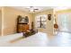 Inviting foyer with tile flooring, decorative glass door, and wooden accents at 9313 Lisbon St, Seffner, FL 33584