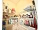 Well-stocked pantry with wire shelving, providing ample storage for groceries and household goods at 9313 Lisbon St, Seffner, FL 33584