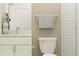 Neutral bathroom with a white vanity, granite countertop, toilet, and tiled glass door shower at 9376 Gladsome Dr, Land O Lakes, FL 34637