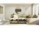 Bright living room with sectional sofa, large mirror, and contemporary decor at 9376 Gladsome Dr, Land O Lakes, FL 34637
