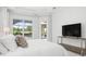 Bright bedroom featuring an exterior door to the backyard at 984 Chickadee Dr, Venice, FL 34285