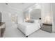 Bedroom featuring neutral decor and a tray ceiling at 984 Chickadee Dr, Venice, FL 34285